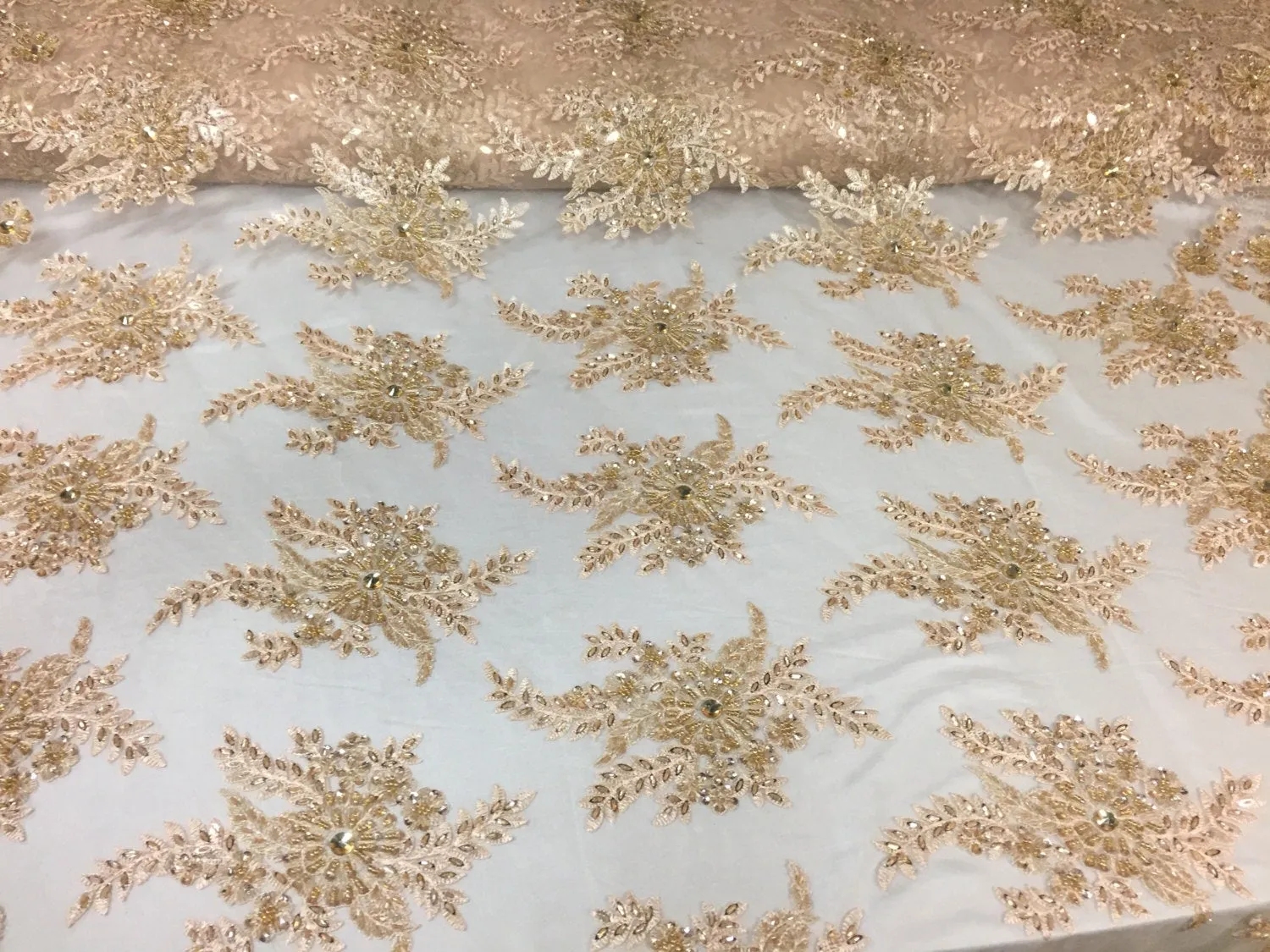 Champagne imperial flower design embroider and beaded on a mesh lace -yd