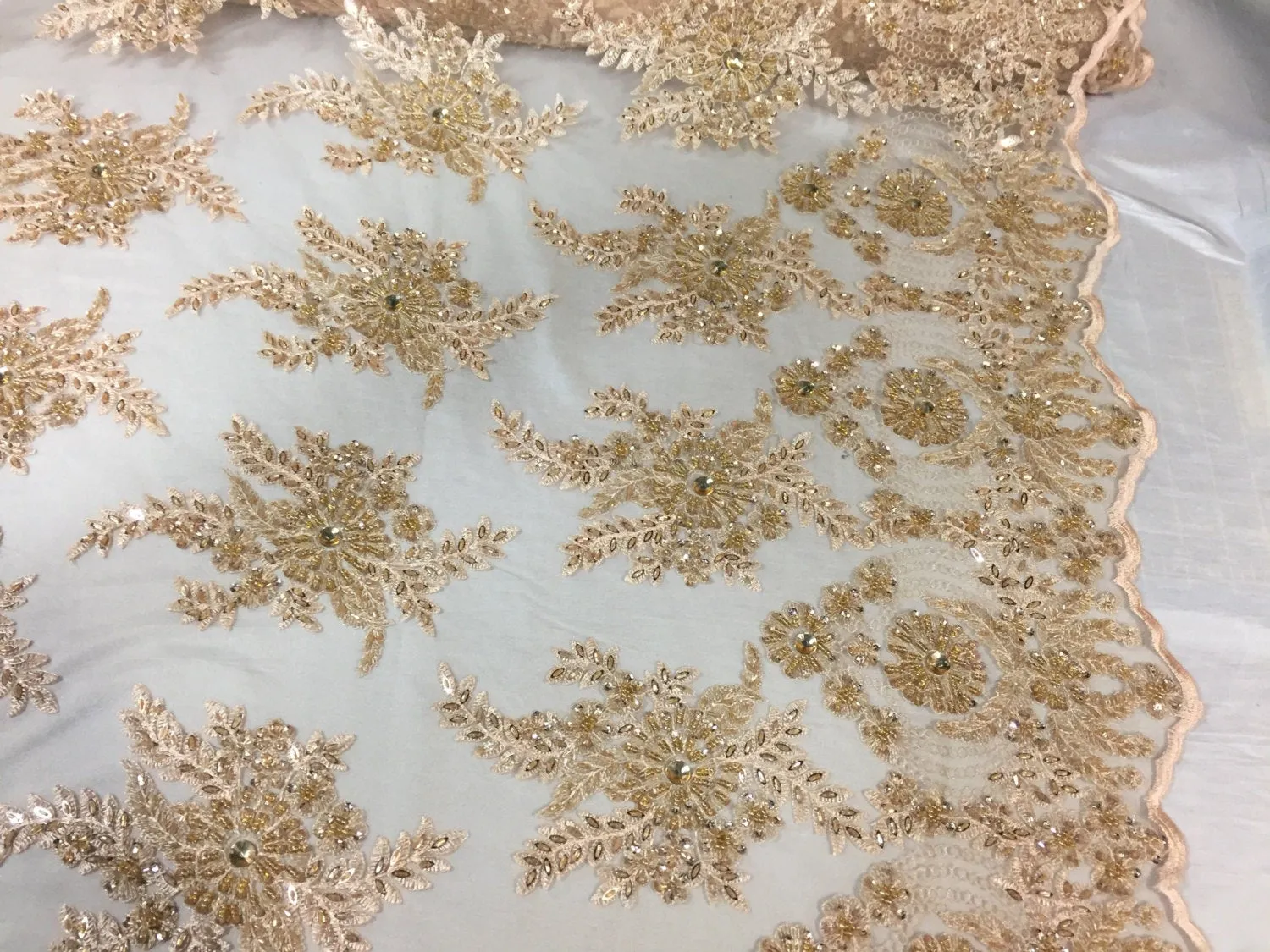 Champagne imperial flower design embroider and beaded on a mesh lace -yd